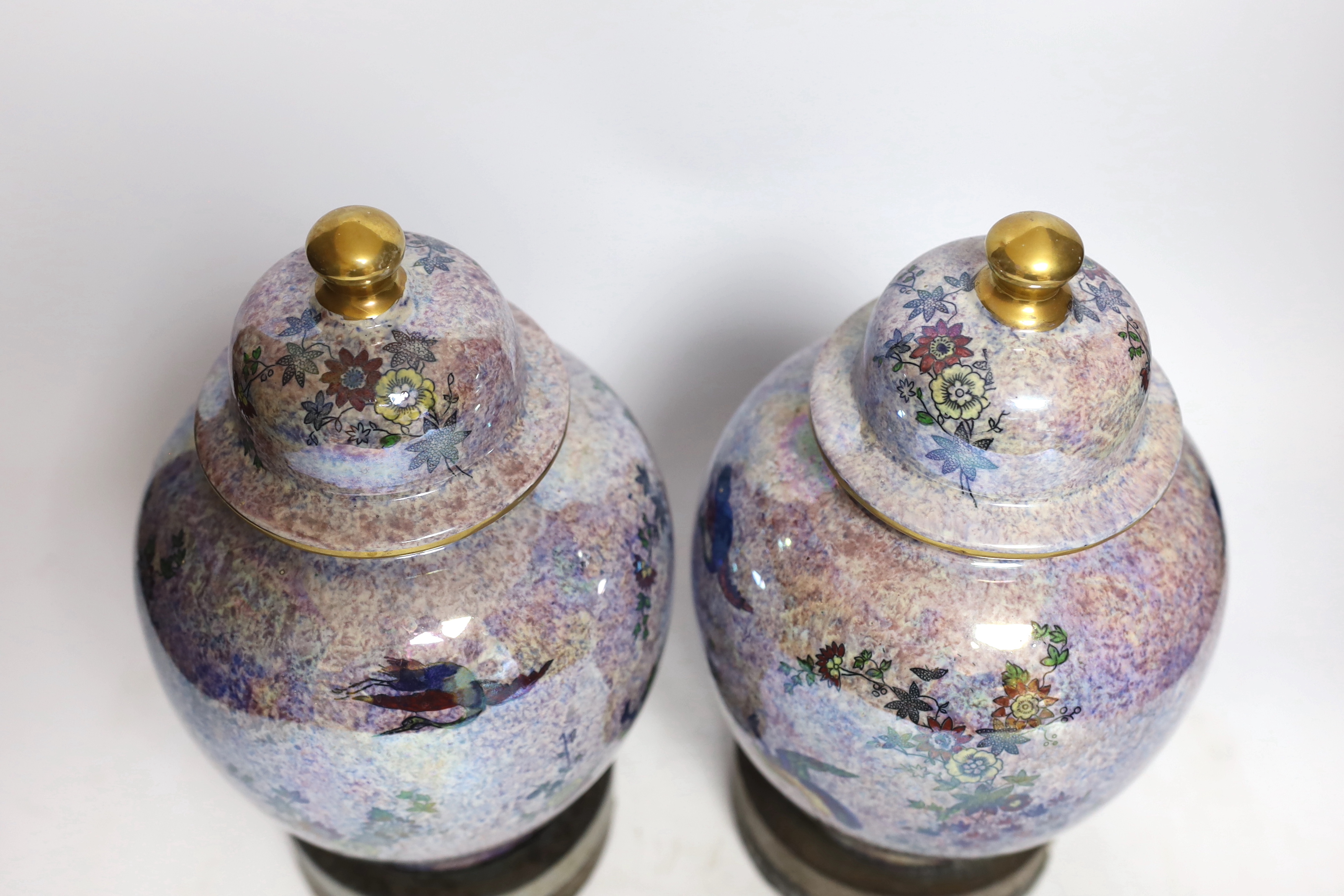 A pair of Wilton ware lustre glazed lidded vases on stands and a Losol vase (3) tallest 30cm